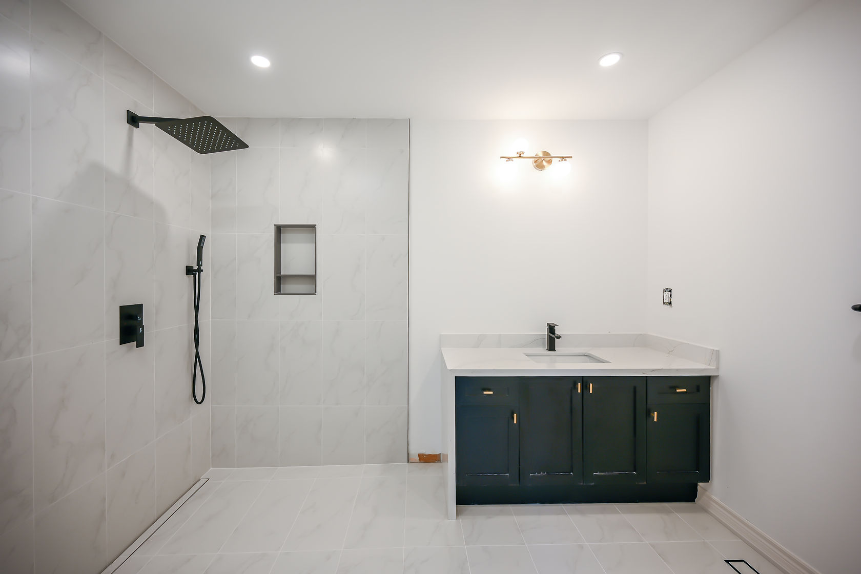 Modern finished bathroom with strong color contrast and clean lines — excellent portfolio piece across all channels — Stonehenge, Hamilton | MTC Renovations