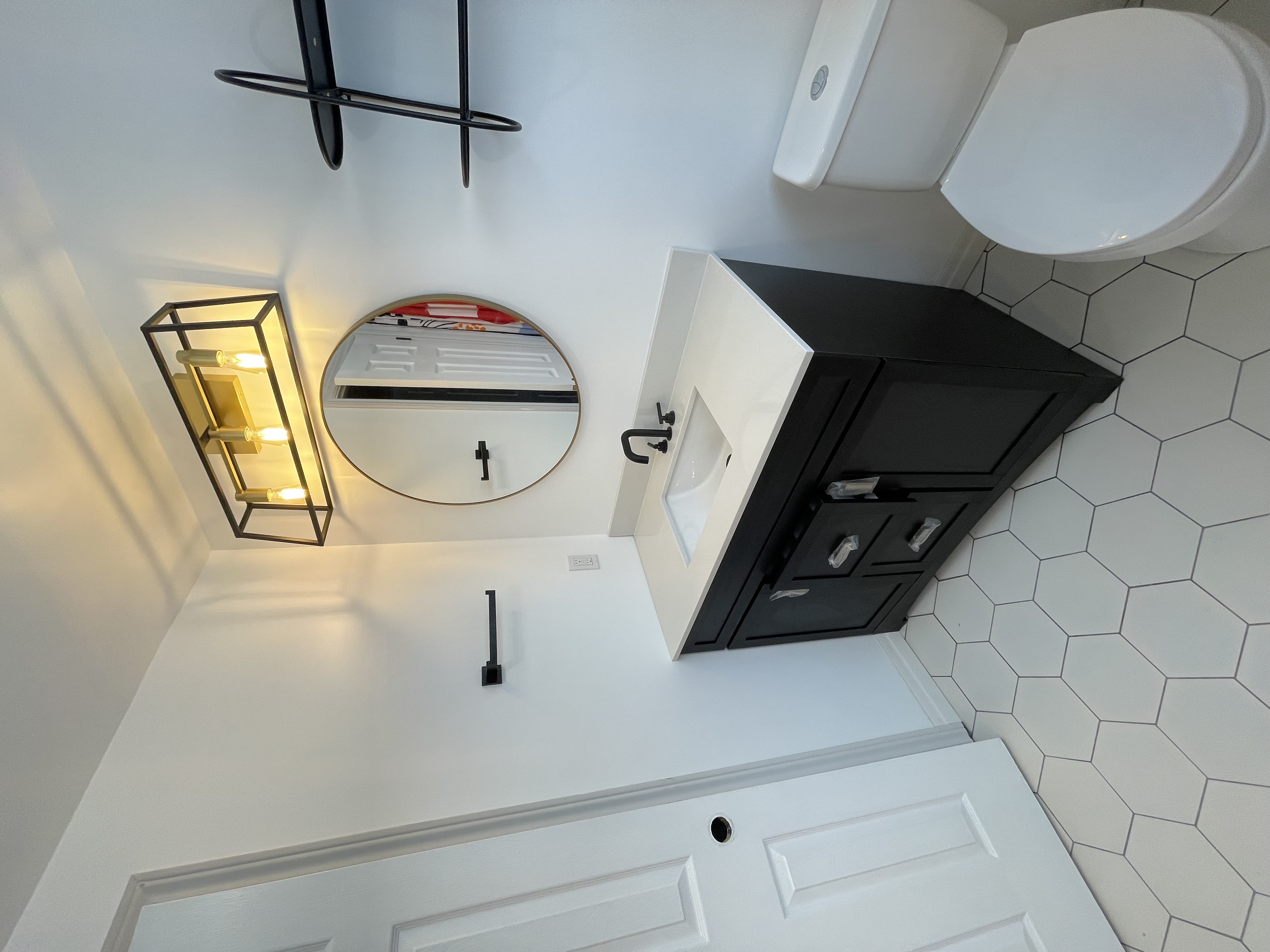 Clean modern bathroom with strong design elements and good lighting — excellent portfolio piece — Buchanan, Hamilton | MTC Renovations