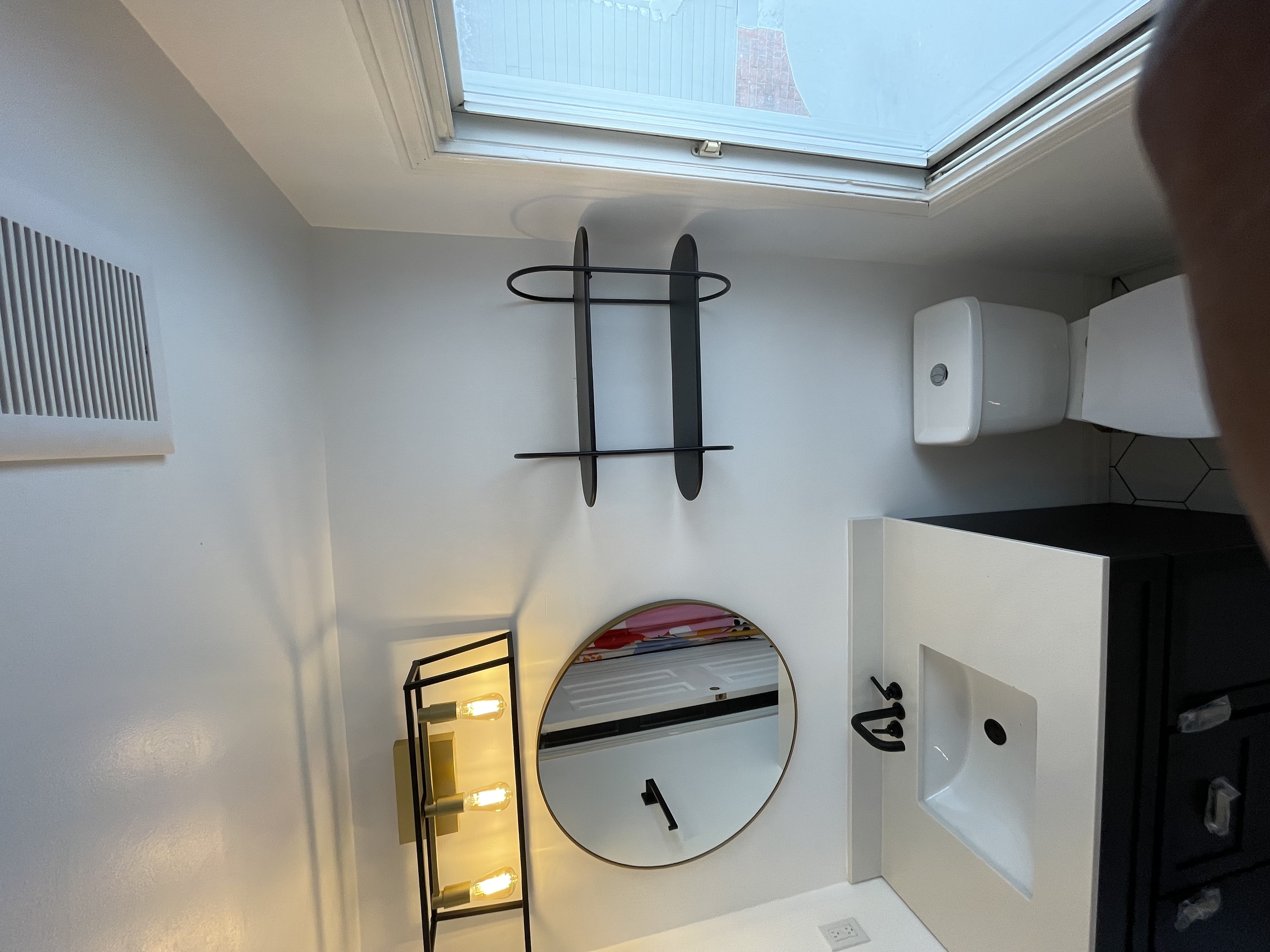Clean modern powder room with excellent natural light and contemporary finishes — strong portfolio piece — Buchanan, Hamilton | MTC Renovations