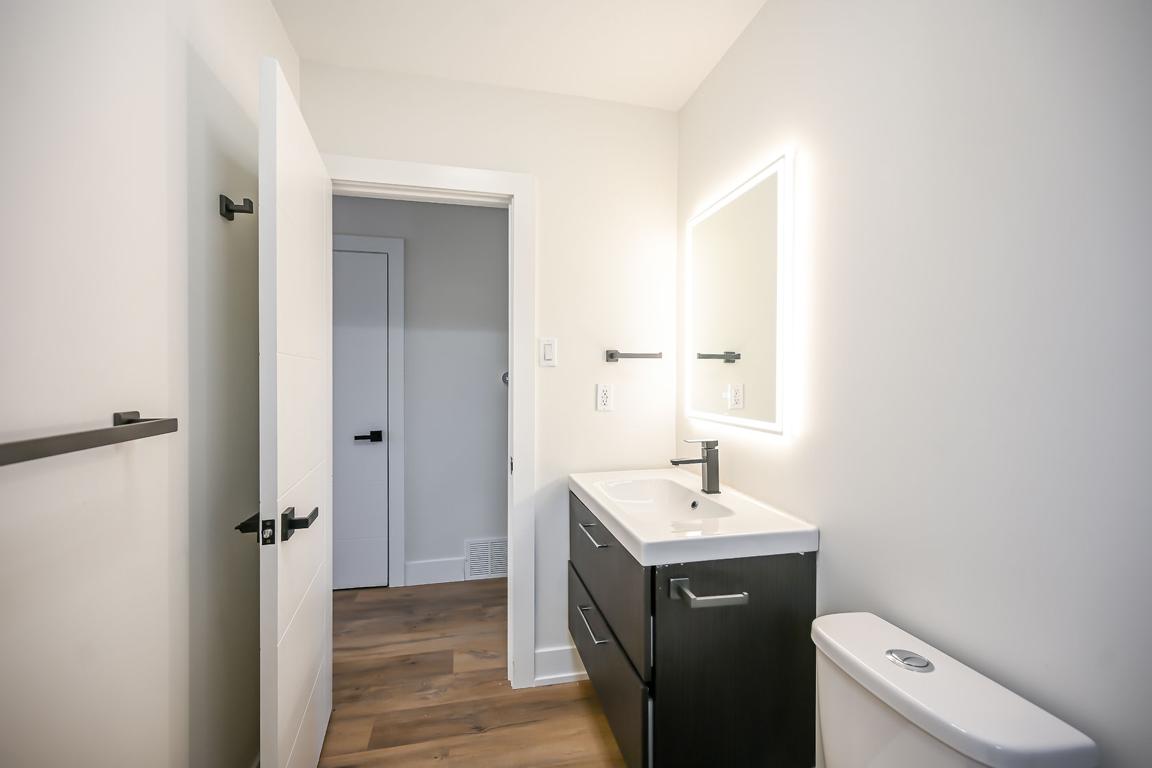 Clean modern bathroom with excellent lighting and professional staging — strong portfolio piece for virtual tours and website — Winchester, Hamilton | MTC Renovations