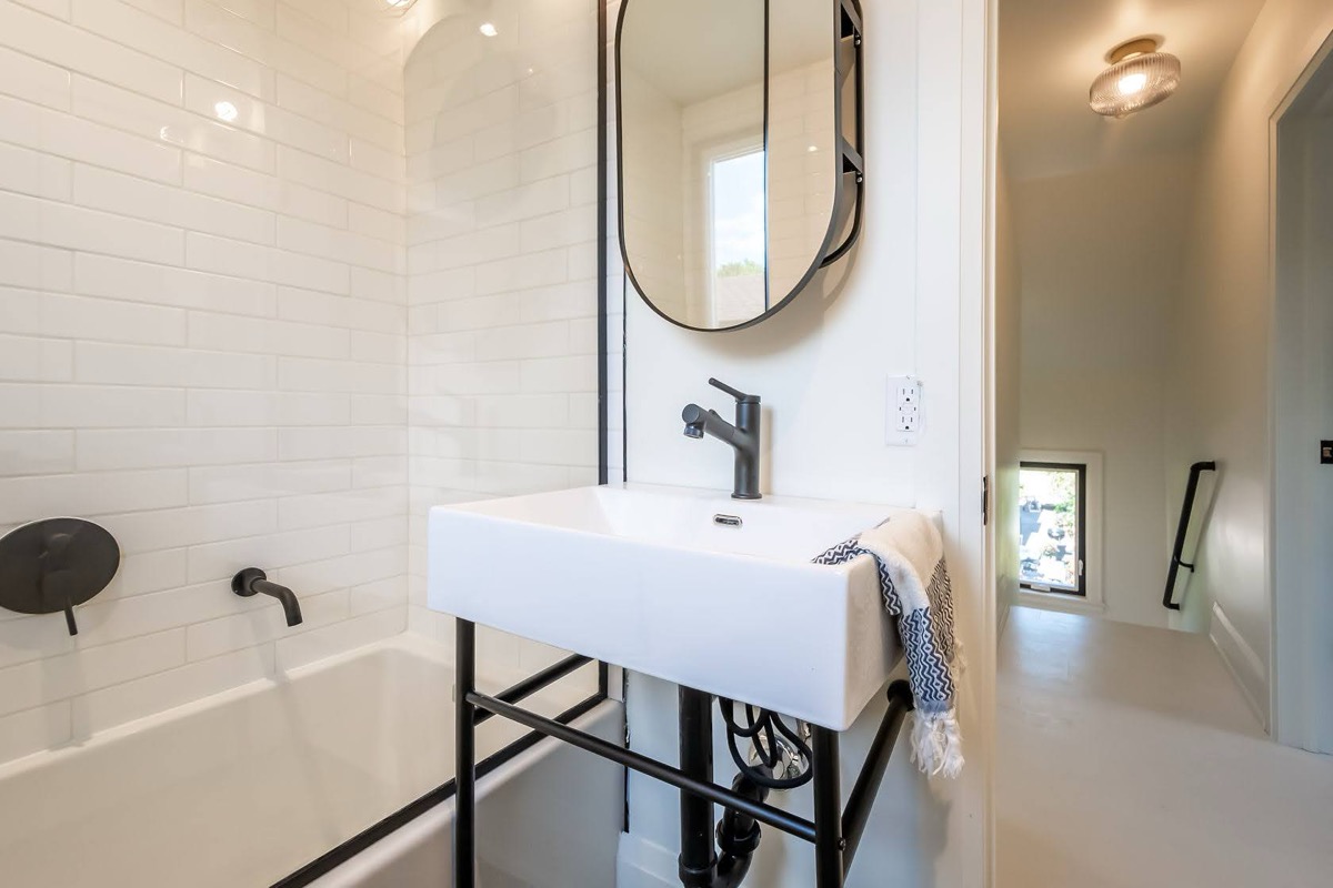 Bright modern bathroom with strong design elements and professional staging — premium portfolio shot — Rosedene, Hamilton | MTC Renovations
