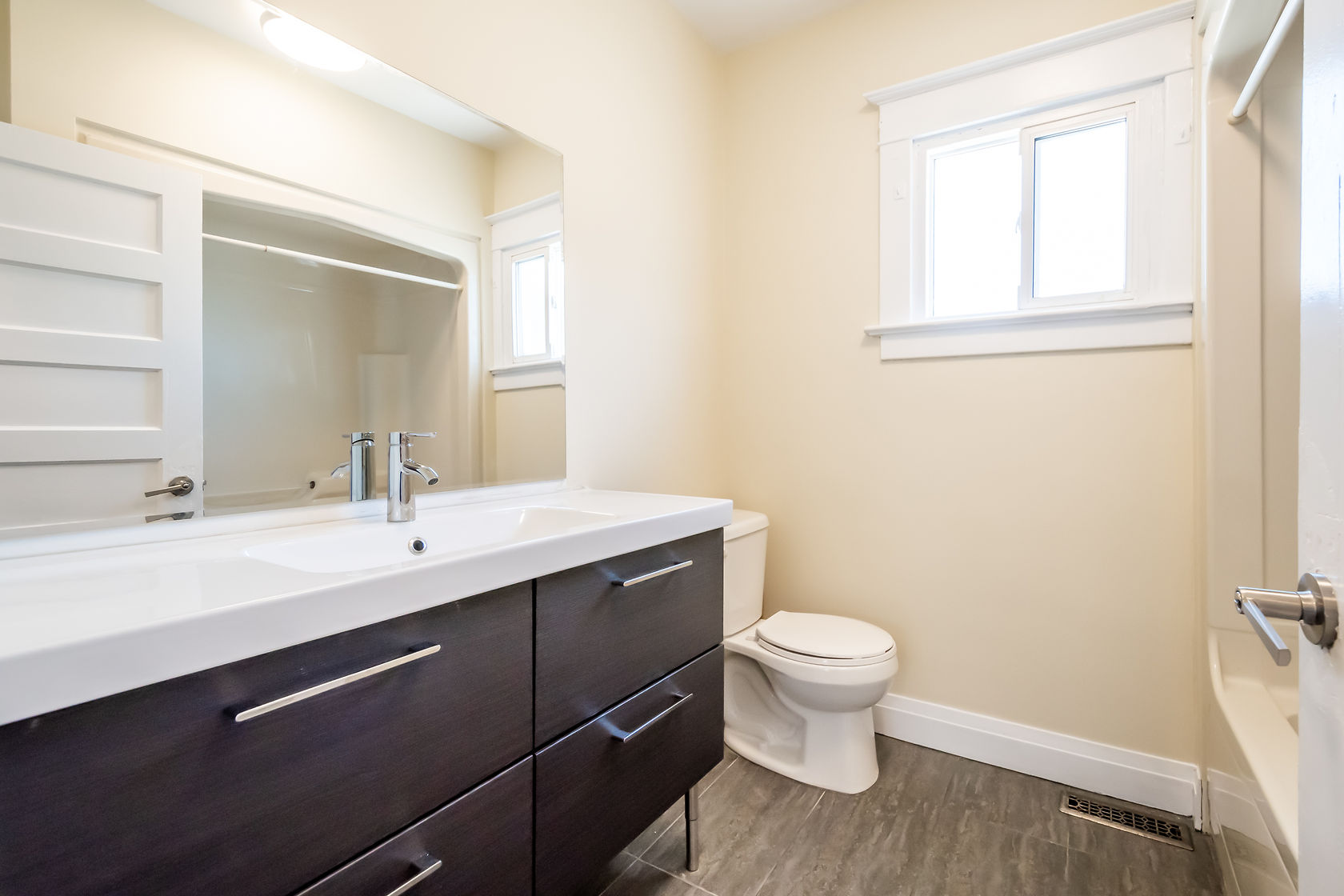 Clean finished bathroom with good natural light and modern finishes — strong portfolio piece for virtual tours and marketing — Eastchester, Hamilton | MTC Renovations