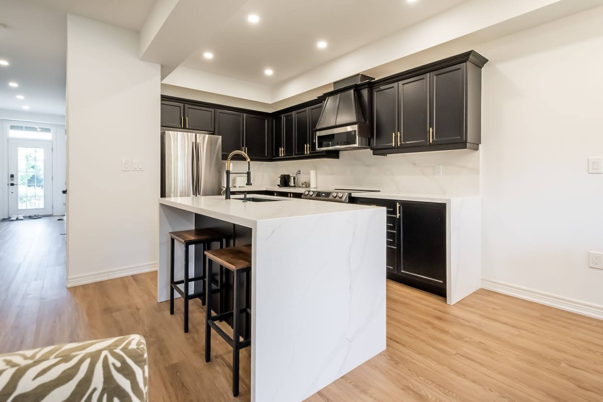 Premium finished kitchen with excellent material contrast and professional staging — Stonehenge, Hamilton | MTC Renovations