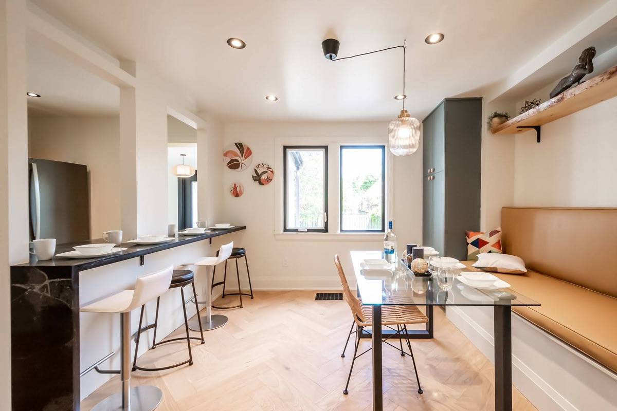 Bright modern kitchen with excellent natural light, clean staging, and strong material contrast — premium portfolio shot — Rosedene, Hamilton | MTC Renovations