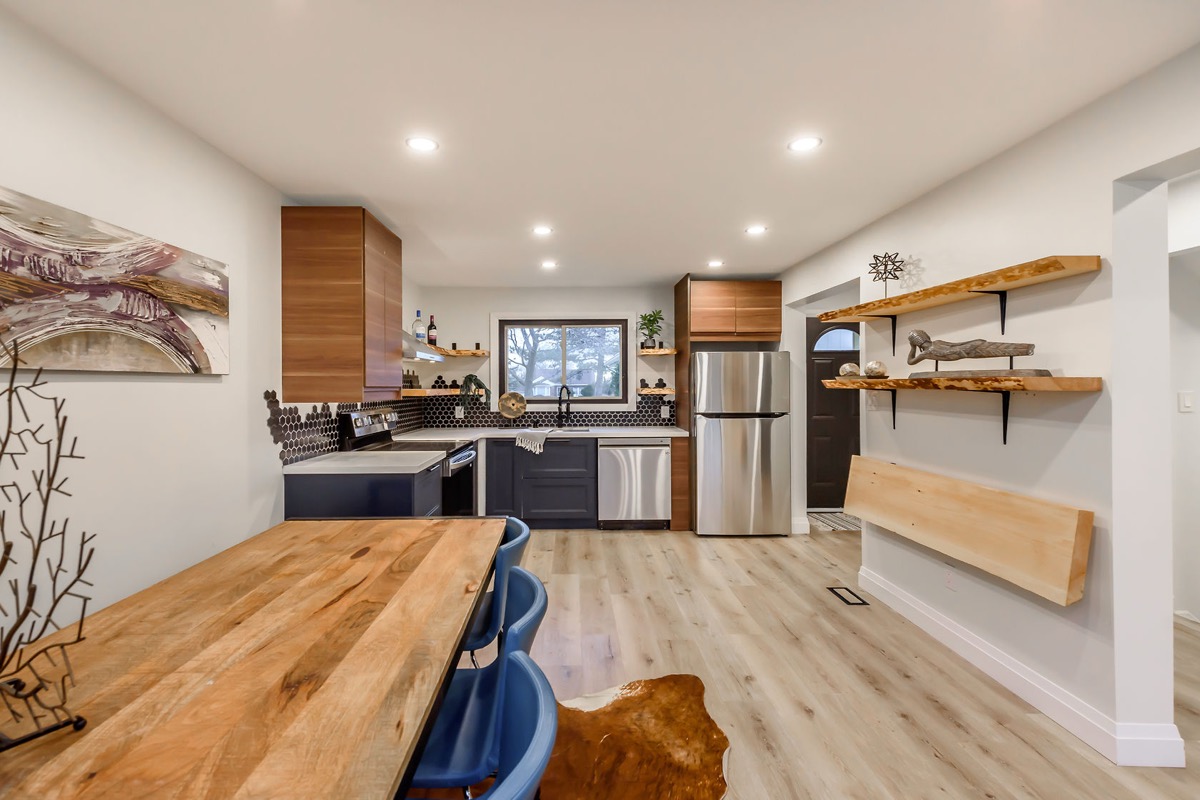 Premium finished kitchen with stunning wood grain contrast, professional staging, and wide-angle composition perfect for virtual tours and hero imagery — Gateshead, Hamilton | MTC Renovations