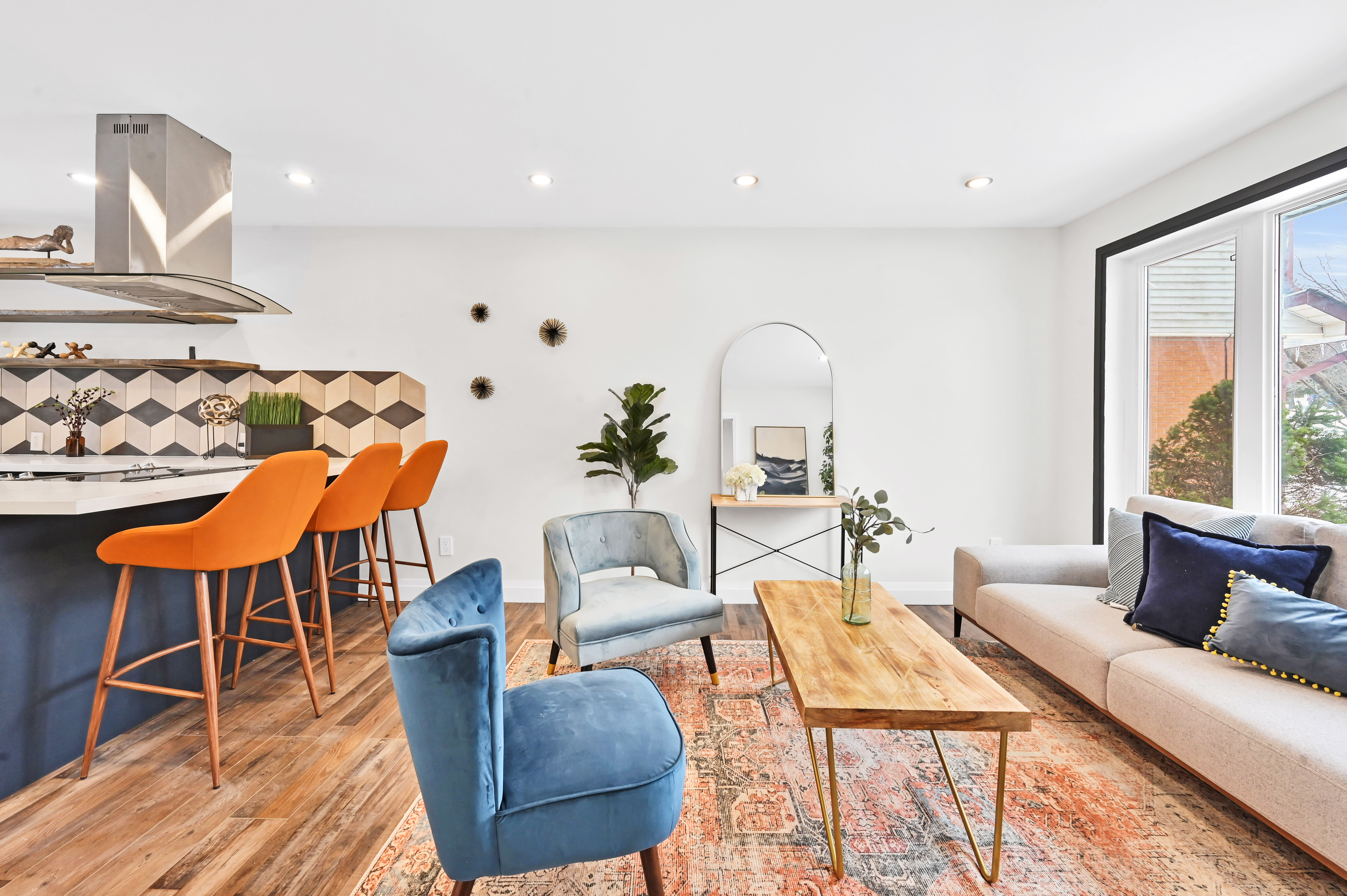 Stunning open-concept living room with fresh paint, clean wall finishes, and professional staging — Kron, Hamilton | MTC Renovations
