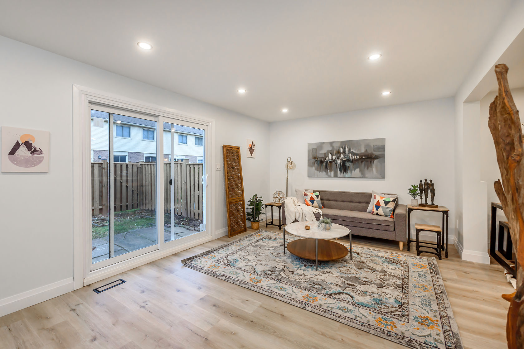 Living room with warm paint tones, staged furniture, and quality wall finishes — Gateshead, Hamilton | MTC Renovations