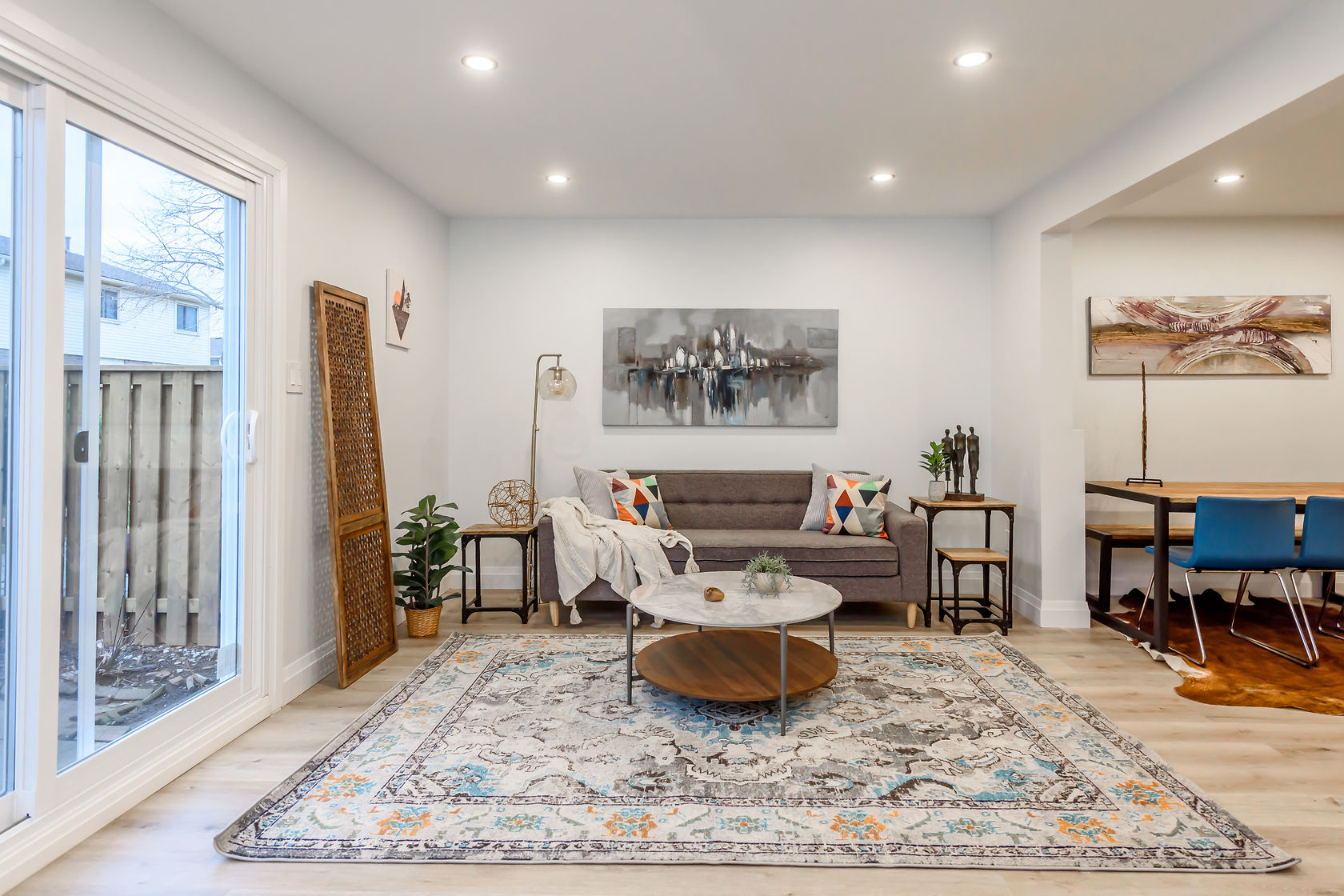 Open-concept living space with freshly painted walls and professional staging — Gateshead, Hamilton | MTC Renovations